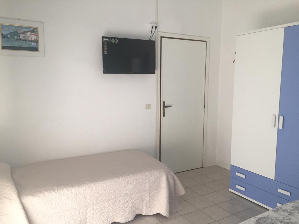 Postel nebo postele na pokoji v ubytování Hotel Halifax