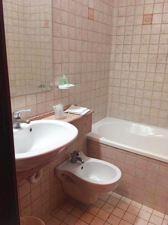 Koupelna v ubytování Hotel Albatros