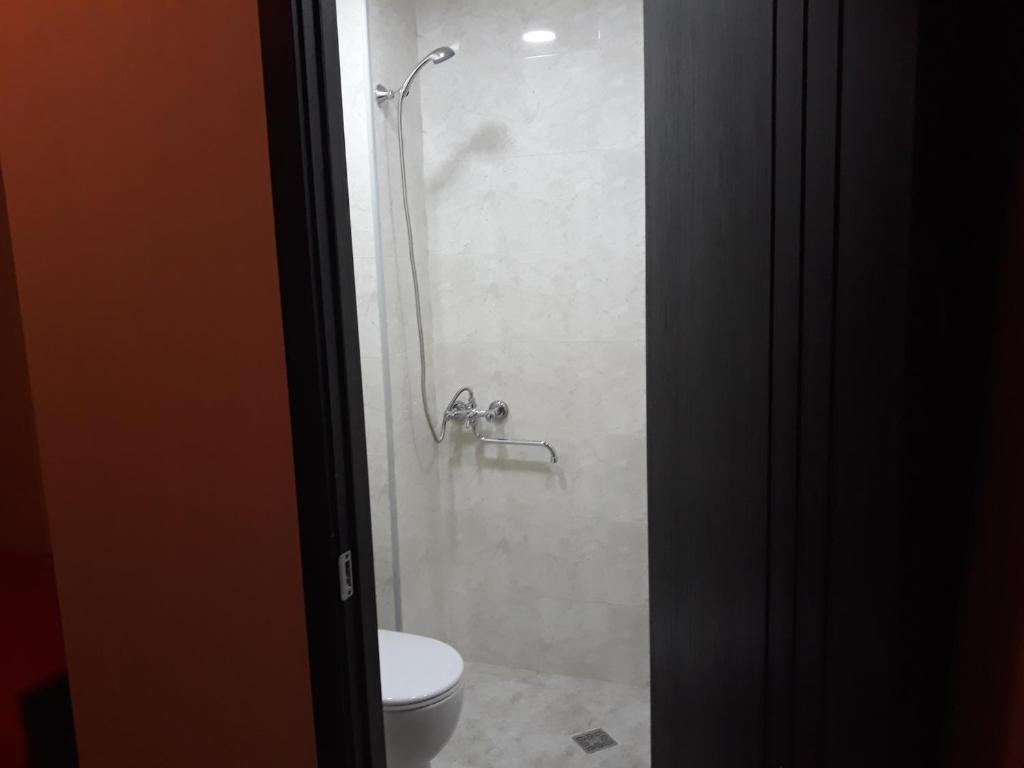 Koupelna v ubytování Dima's Guesthouse
