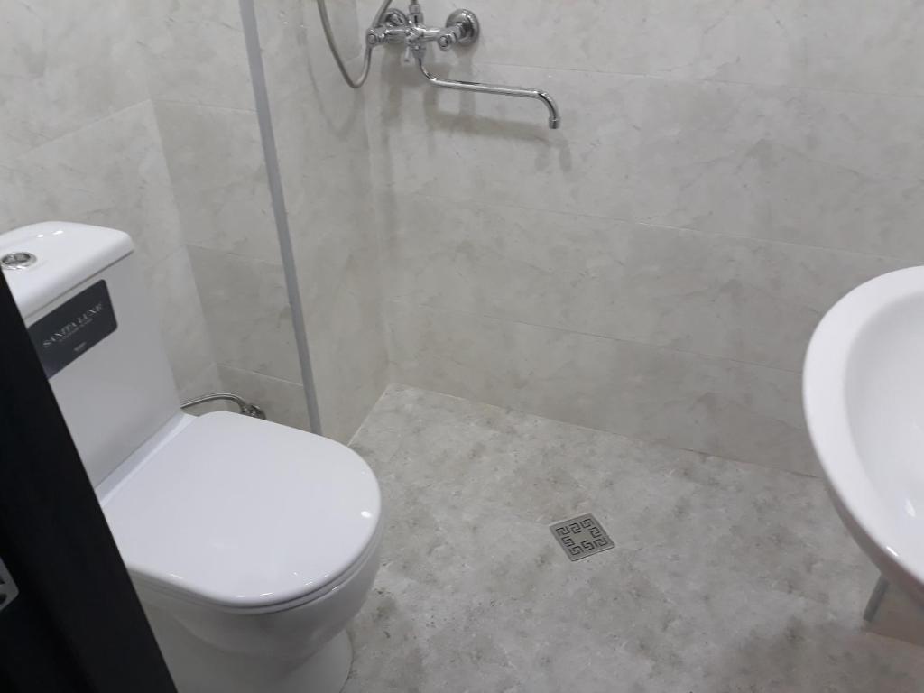 Koupelna v ubytování Dima's Guesthouse