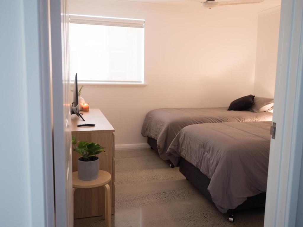 Postel nebo postele na pokoji v ubytování FortyOne - Oceanside Retreat Busselton