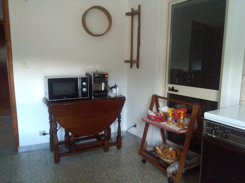 Kuchyň nebo kuchyňský kout v ubytování B&B Notte Al Museo