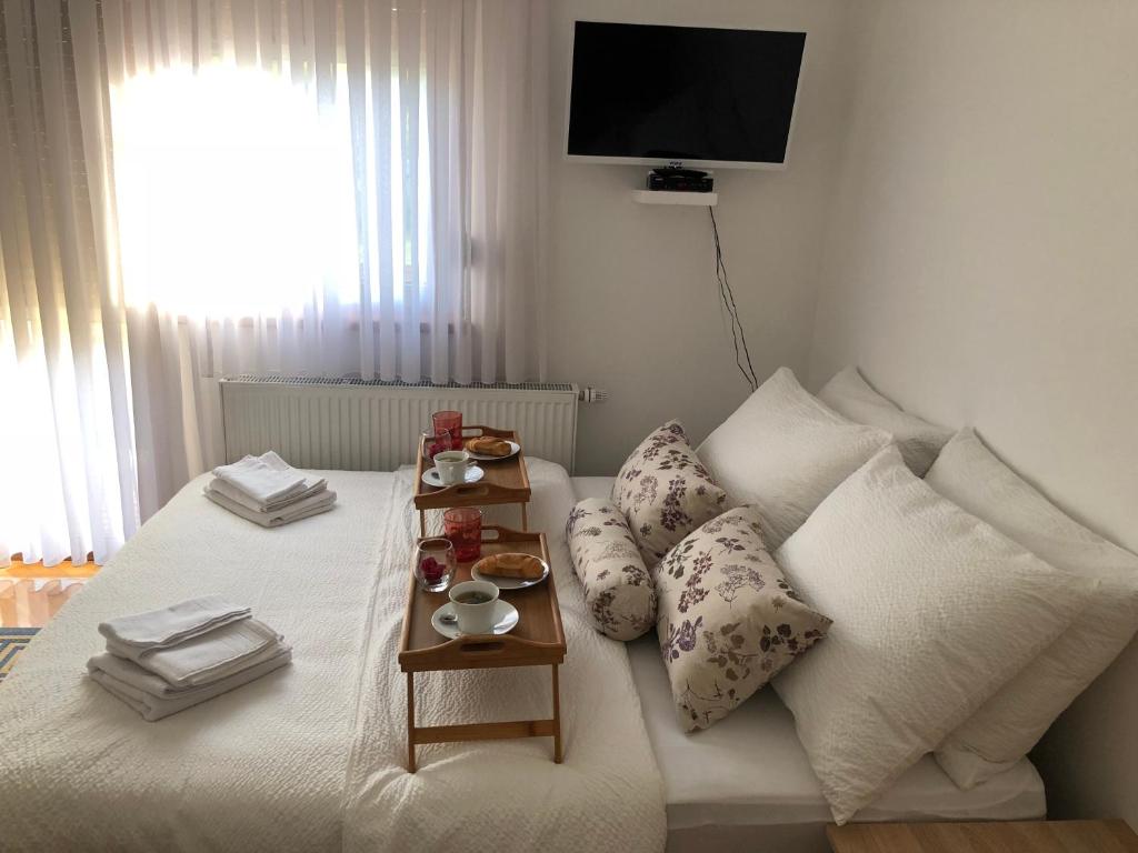 Postel nebo postele na pokoji v ubytování Apartment Satori