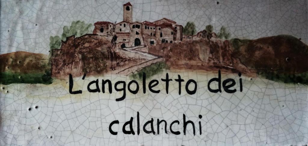 un dibujo de un castillo en la cima de una montaña en L'Angoletto dei Calanchi, en San Michele in Teverina