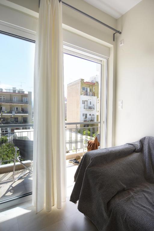 A seating area at Christini Apartment