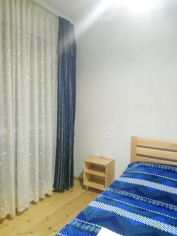 Postel nebo postele na pokoji v ubytování guest house katia tbilisi