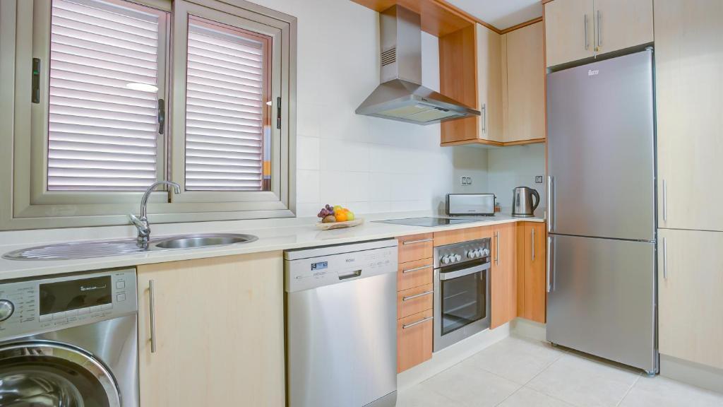 A kitchen or kitchenette at Villa Del Corazon Salinas Golf