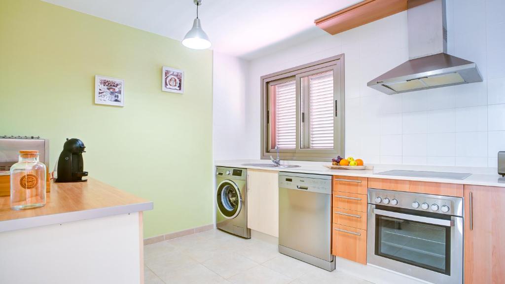 A kitchen or kitchenette at Villa Del Corazon Salinas Golf