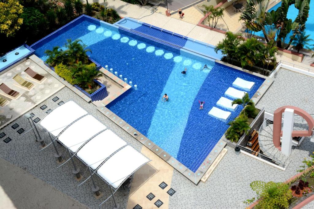 Bazén v ubytování Playa Almendro Resort nebo v jeho okolí