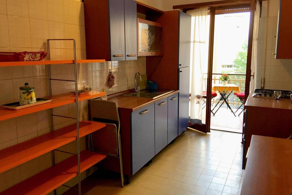 A kitchen or kitchenette at Roma Cinecittà Free WI-FI