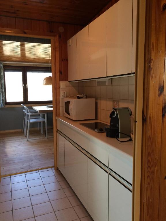 Kuchyň nebo kuchyňský kout v ubytování Pfahlbau in Weiden am See