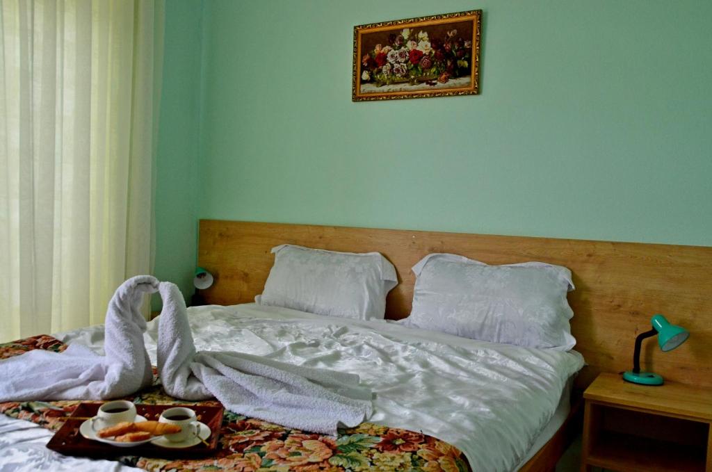 Postel nebo postele na pokoji v ubytování Boutique Hotel Eco-House Tbilisi
