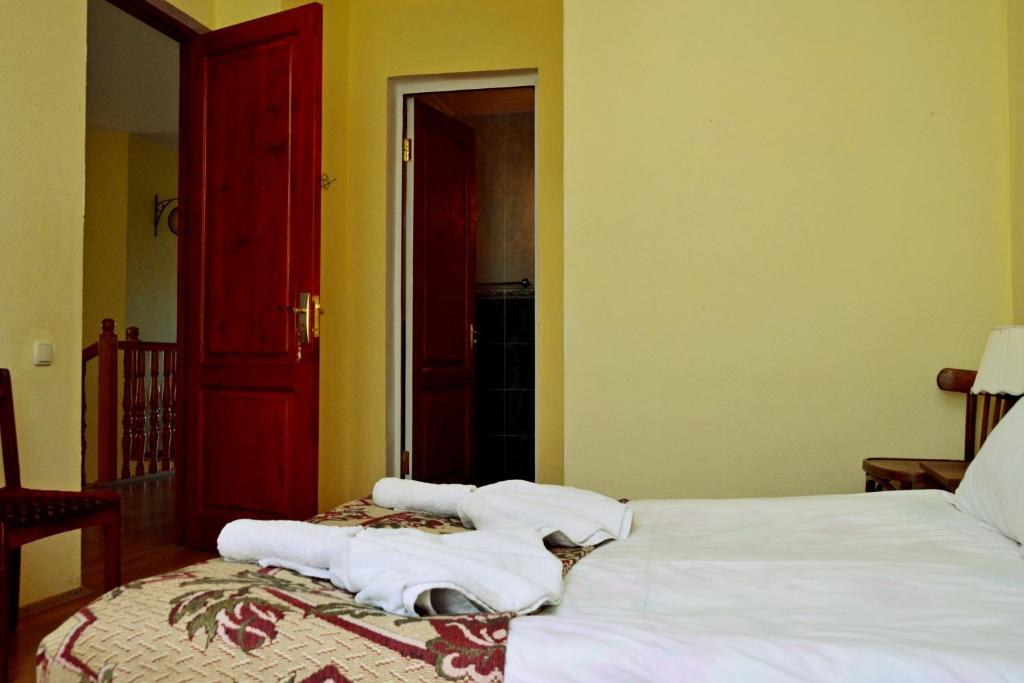 Postel nebo postele na pokoji v ubytování Boutique Hotel Eco-House Tbilisi