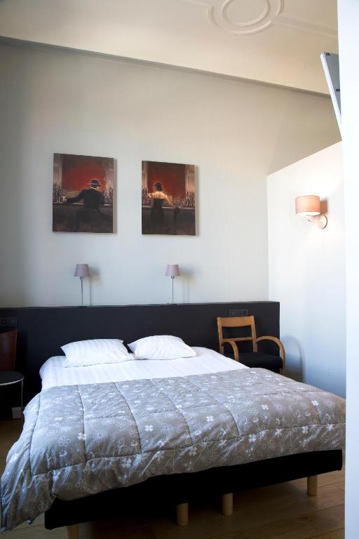 Postel nebo postele na pokoji v ubytování Hotel La Royale