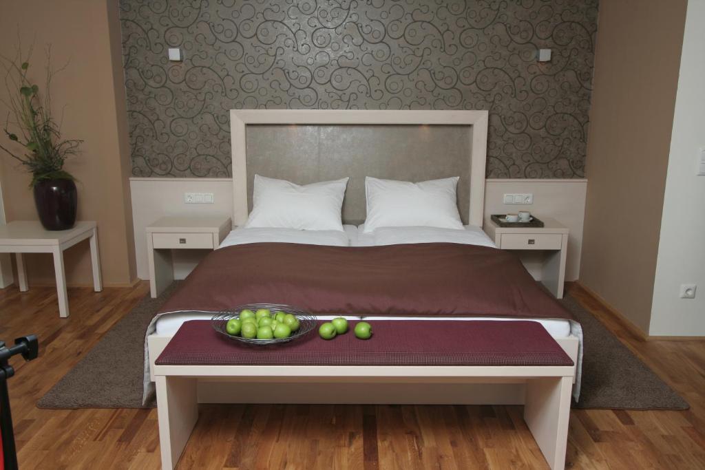 Postel nebo postele na pokoji v ubytování Gasthof & Hotel Wolfsegger
