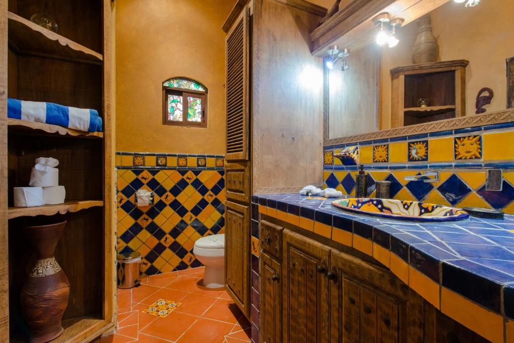 Postel nebo postele na pokoji v ubytování Hacienda Xcaret