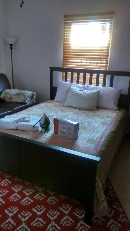 a bedroom with a bed with a box on it at The In-town spot by Beltline in Atlanta
