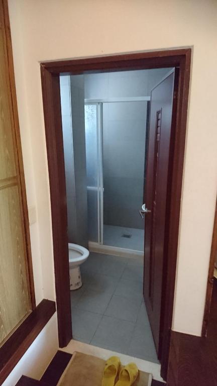 Koupelna v ubytování Knt House