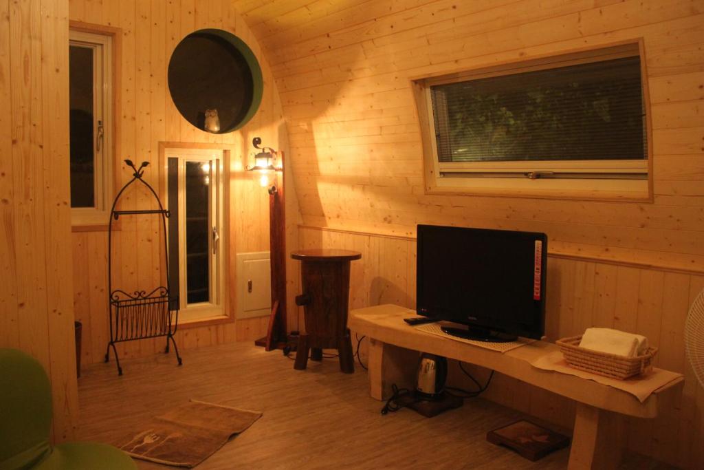 TV a/nebo společenská místnost v ubytování Knt House
