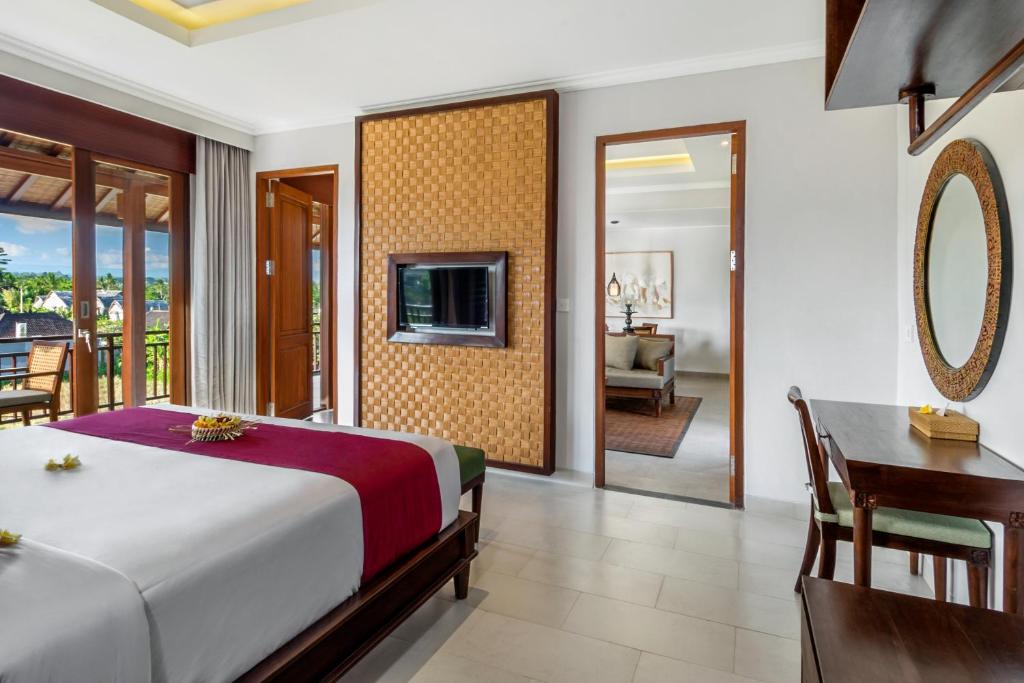 Postel nebo postele na pokoji v ubytování Bumi Muwa Ubud Katiklantang