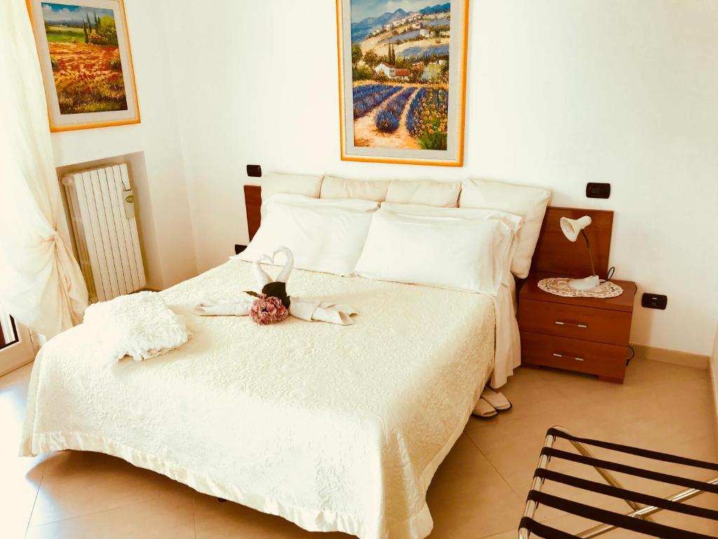 Postel nebo postele na pokoji v ubytování Villa Aurora B&B