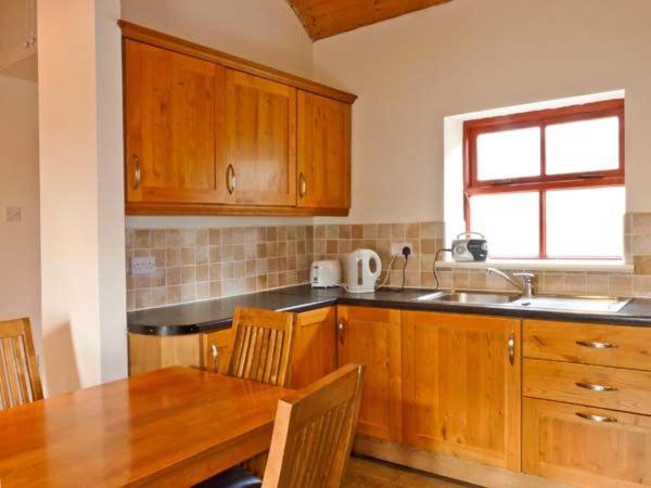 Kuchyň nebo kuchyňský kout v ubytování Cavan Hill Cottage