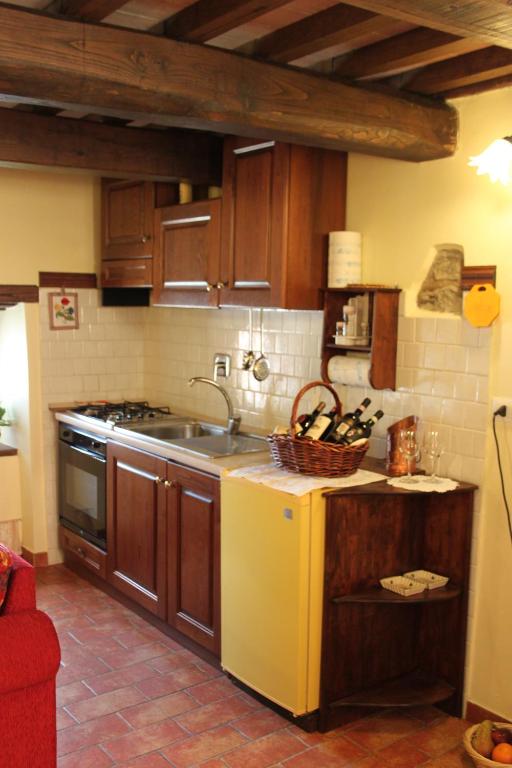 Kuchyň nebo kuchyňský kout v ubytování Casa Vacanze Le Antiche Pietre