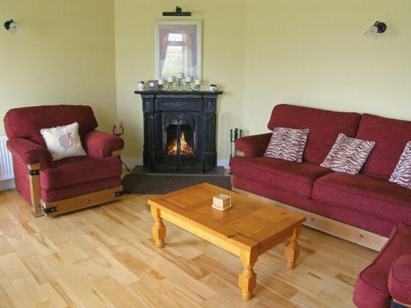 Posezení v ubytování Lough Currane Cottage