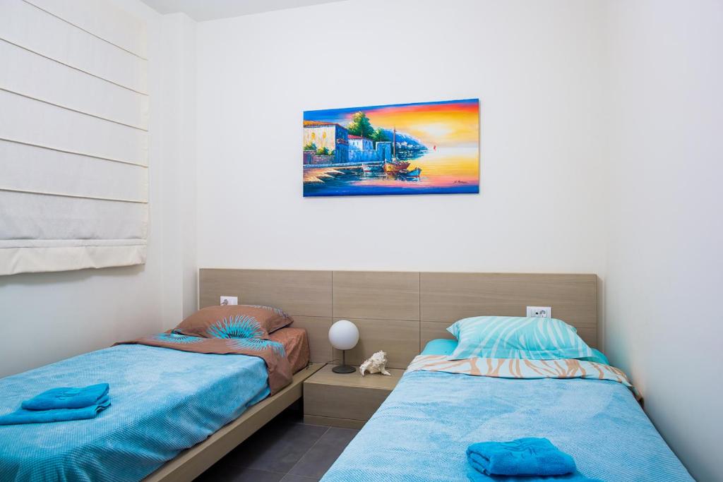 Postel nebo postele na pokoji v ubytování Villa Andrea