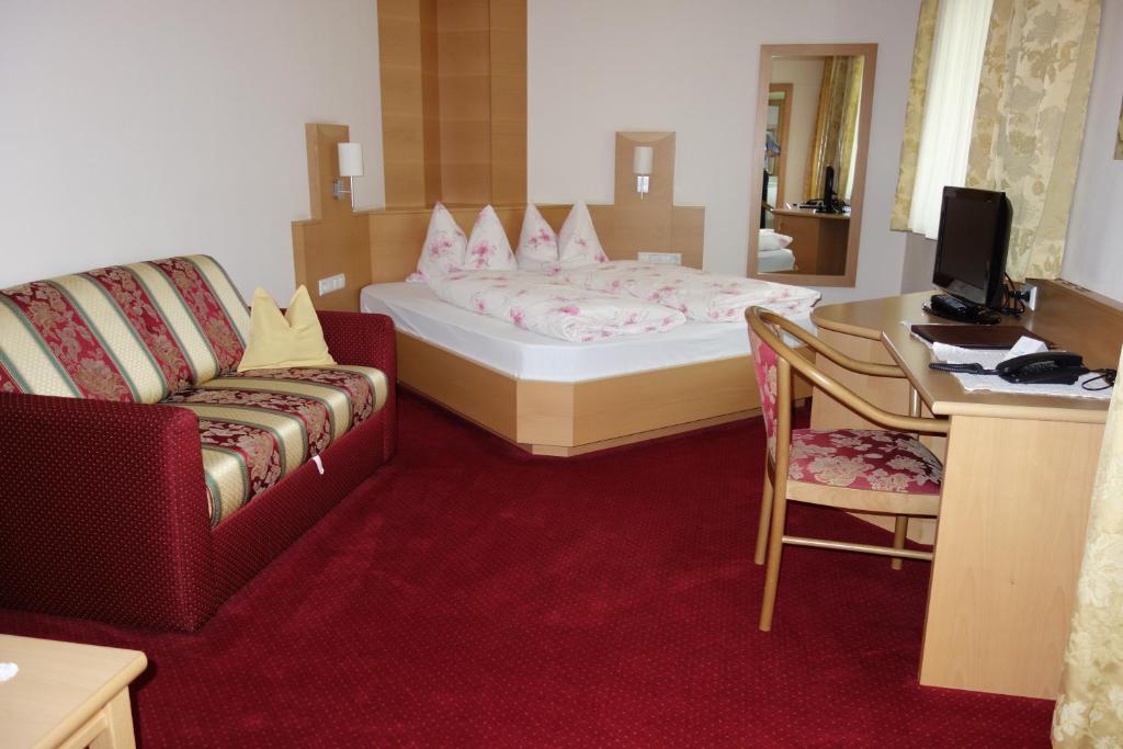 Postel nebo postele na pokoji v ubytování Hotel Elisabeth