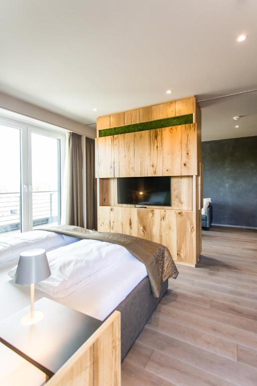 Postel nebo postele na pokoji v ubytování monte mare SAUNA-SPA-SPORTS-HOTEL