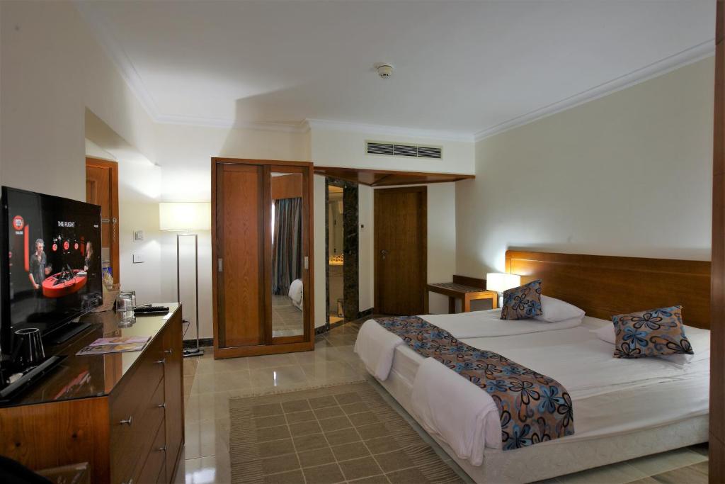 Postel nebo postele na pokoji v ubytování Swiss Inn Resort Dahab