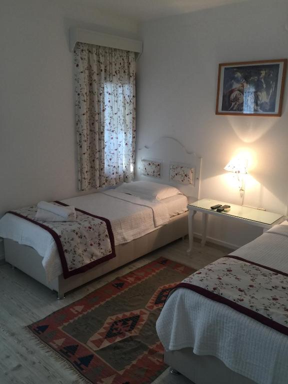 Postel nebo postele na pokoji v ubytování Pasha Motel