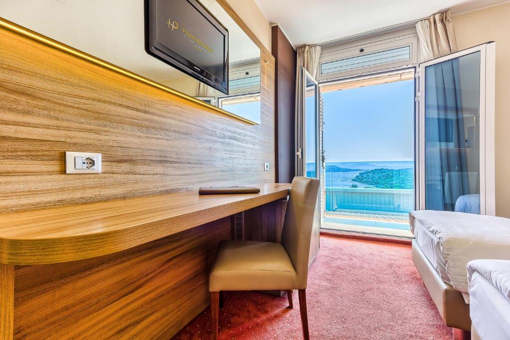 TV a/nebo společenská místnost v ubytování Hotel Panorama