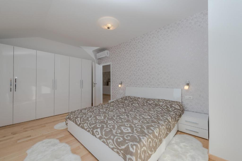 Postel nebo postele na pokoji v ubytování Four bedroom holiday home Horizon
