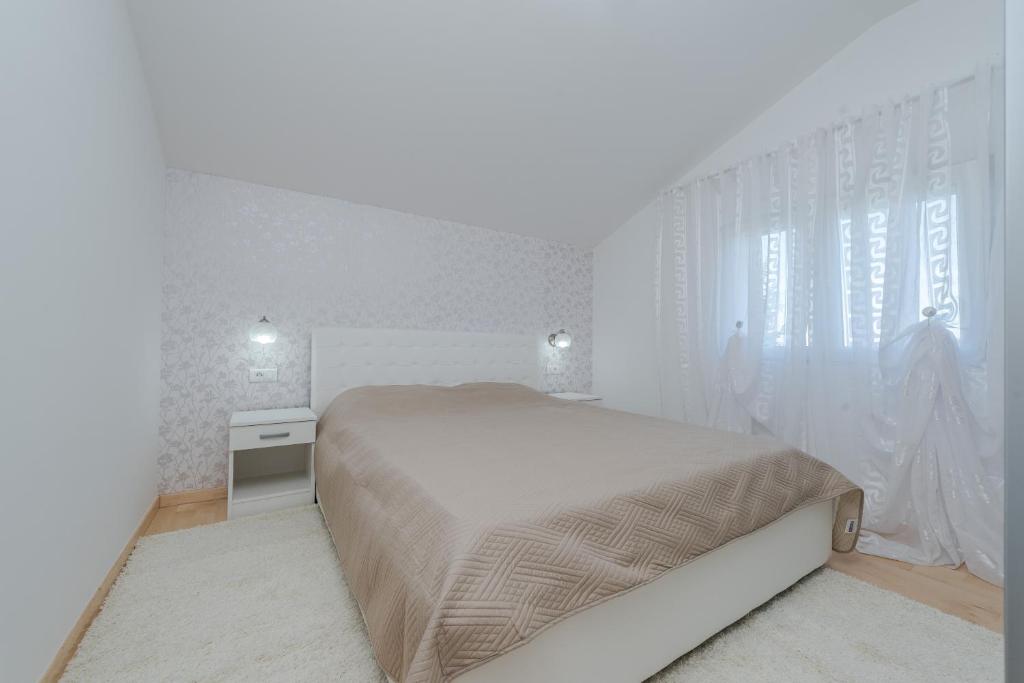 Postel nebo postele na pokoji v ubytování Four bedroom holiday home Horizon