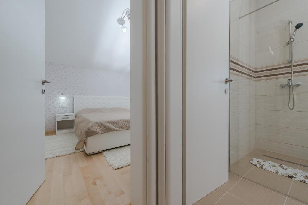 Koupelna v ubytování Four bedroom holiday home Horizon