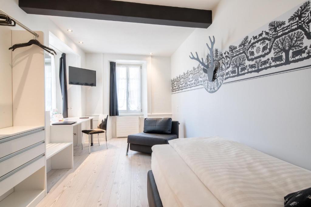 Postel nebo postele na pokoji v ubytování Hotel Murtenhof & Krone