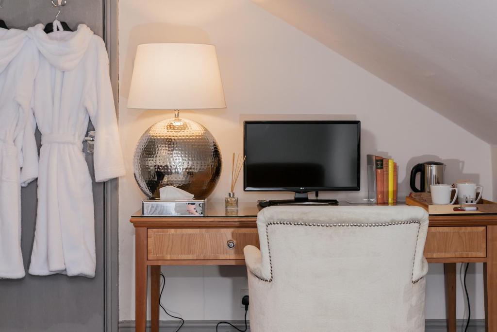 Příslušenství pro přípravu čaje a kávy v ubytování Townhouse No 12