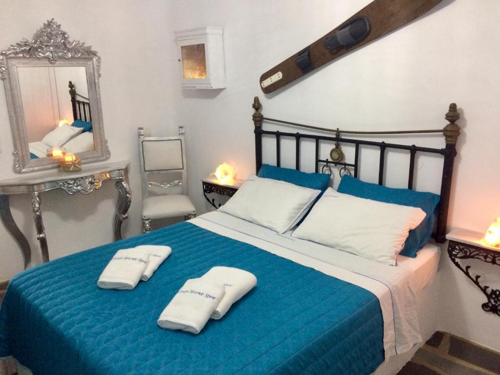 Posteľ alebo postele v izbe v ubytovaní Mykonos Secret Spot