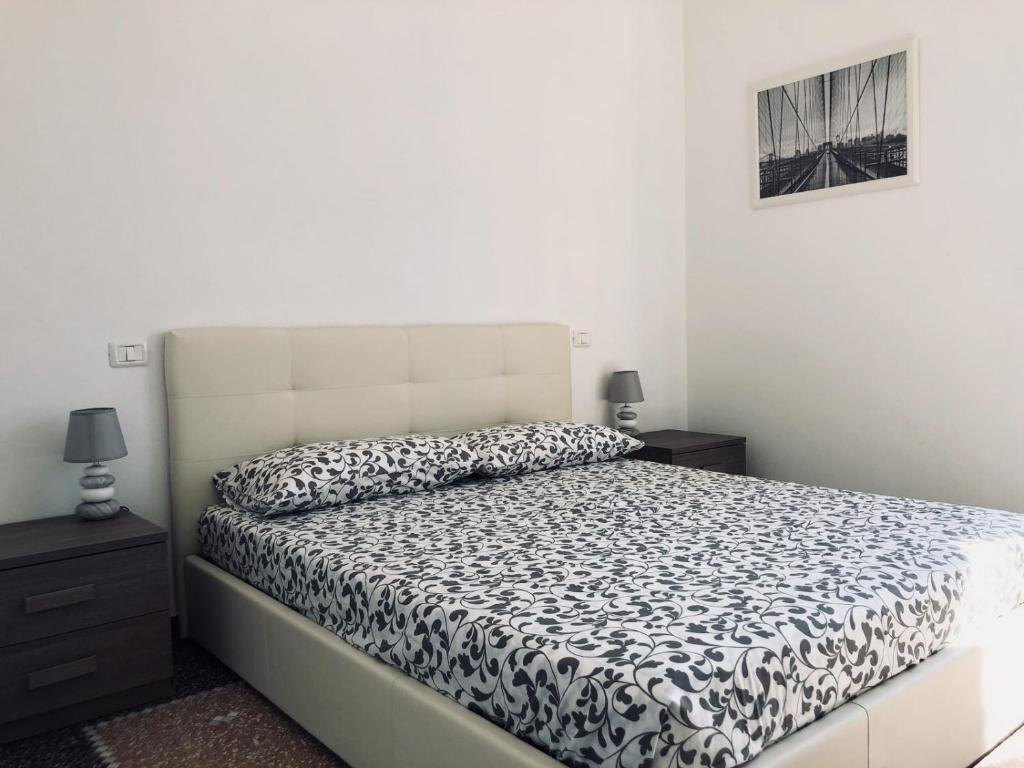 Ένα ή περισσότερα κρεβάτια σε δωμάτιο στο Appartamento "Dolce Nelly"