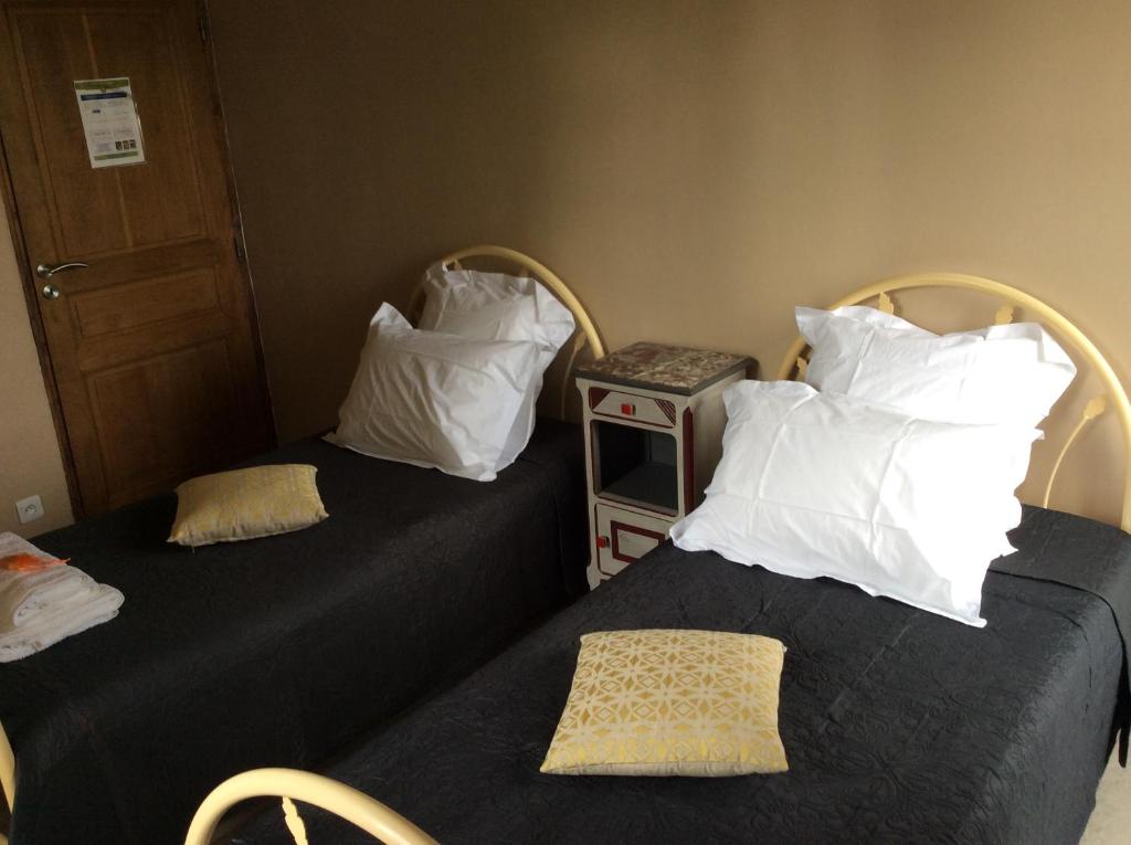 Postel nebo postele na pokoji v ubytování Chambre d'hotes la Quercynoise
