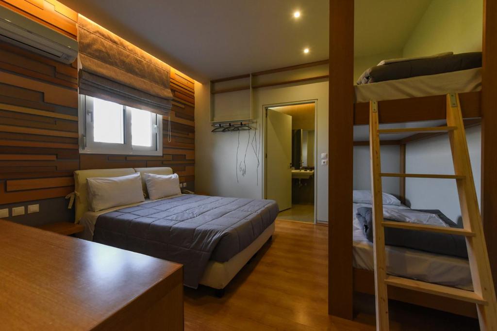 Postel nebo postele na pokoji v ubytování Kleopatra Inn