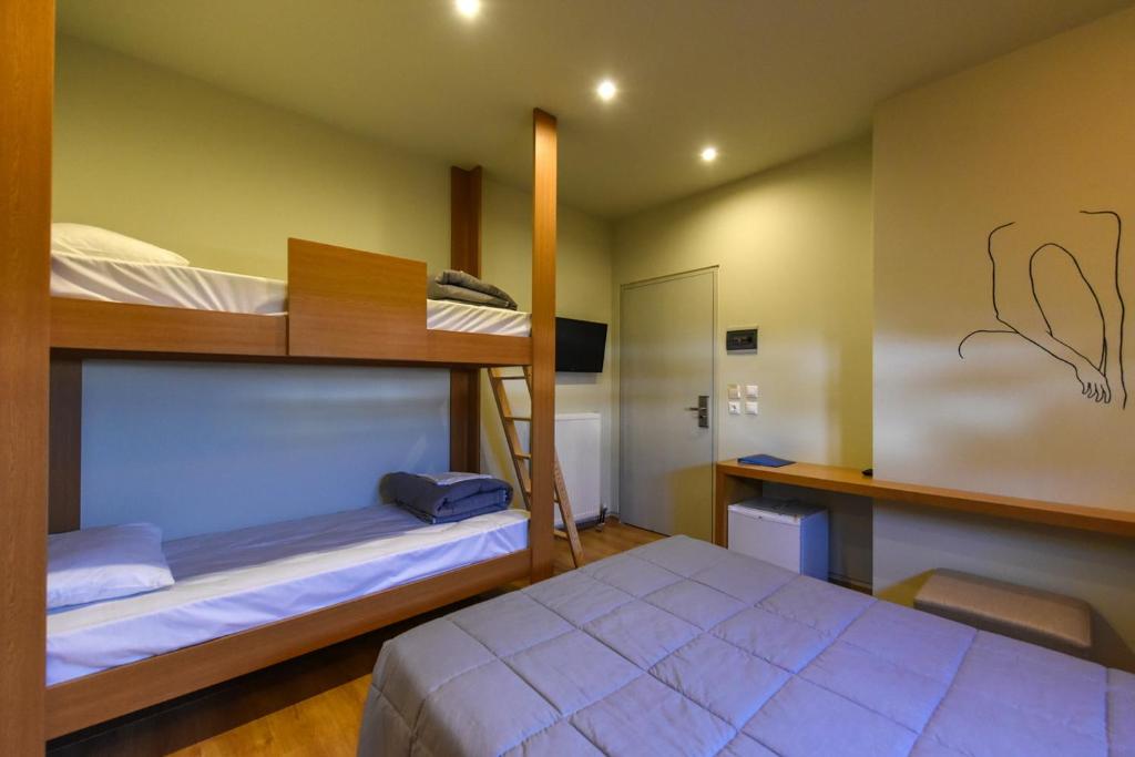 Postel nebo postele na pokoji v ubytování Kleopatra Inn