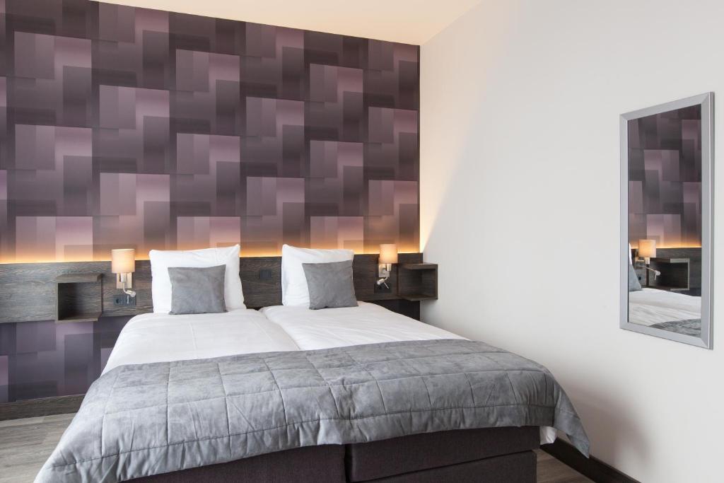 Postel nebo postele na pokoji v ubytování Best Western Hotel Den Haag