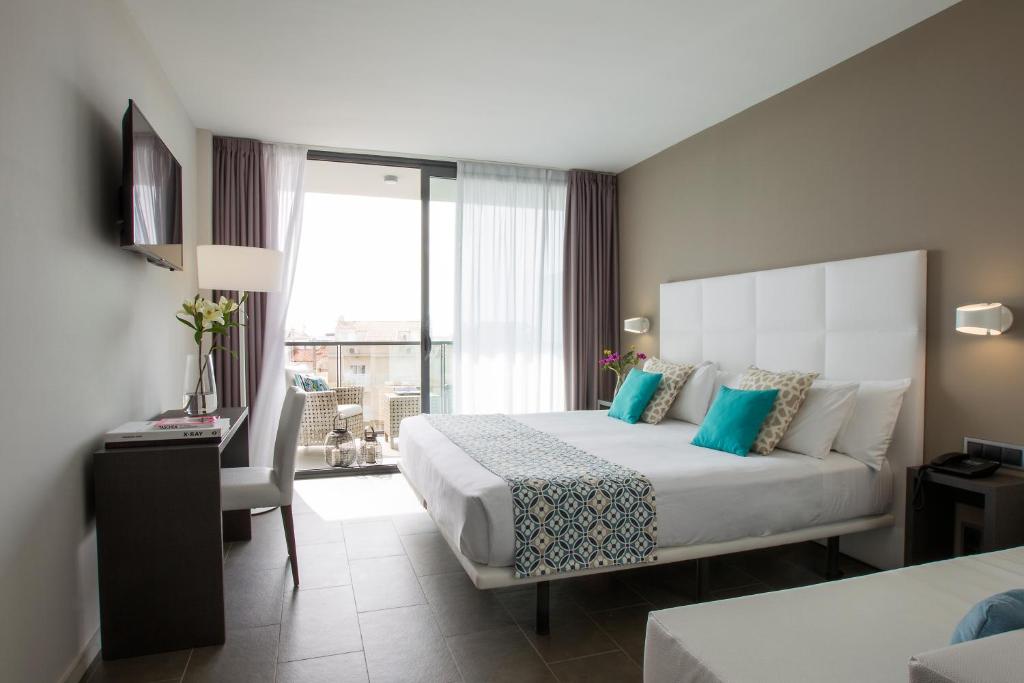 Posteľ alebo postele v izbe v ubytovaní Altafulla Mar Hotel