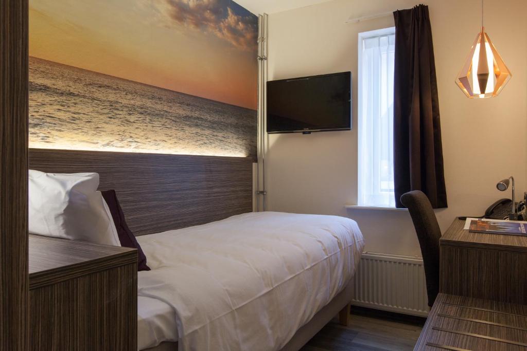 Postel nebo postele na pokoji v ubytování Best Western Hotel Den Haag