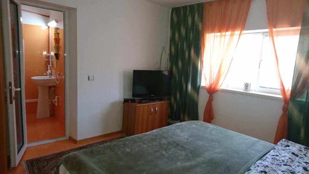 Postel nebo postele na pokoji v ubytování All in Delta Camere de inchiriat
