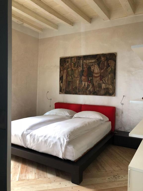 Voodi või voodid majutusasutuse Flora Inn, Flora I - Nel cuore di Bergamo Alta toas