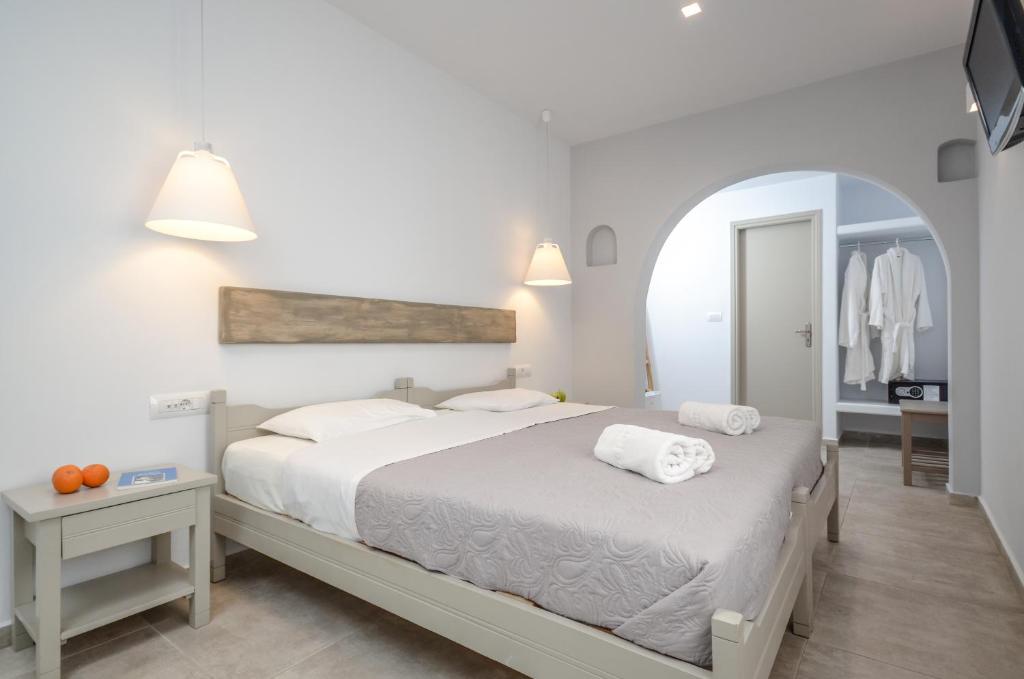 Postel nebo postele na pokoji v ubytování Argo Boutique Hotel